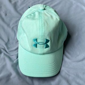 Womens teal Under Armour baseball hat.